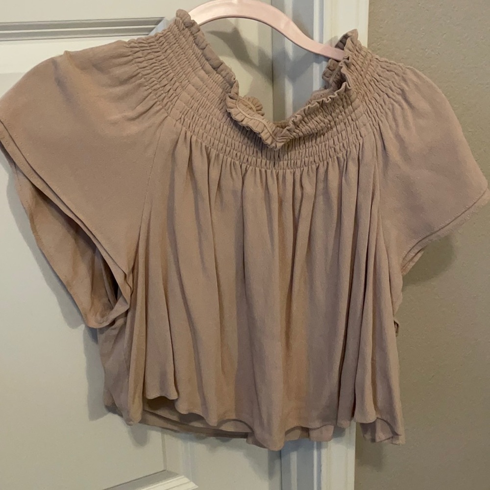 tan female top